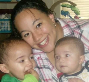 The start of my self healing journey. an image of desiree clemons, and her two sons when she was 17
